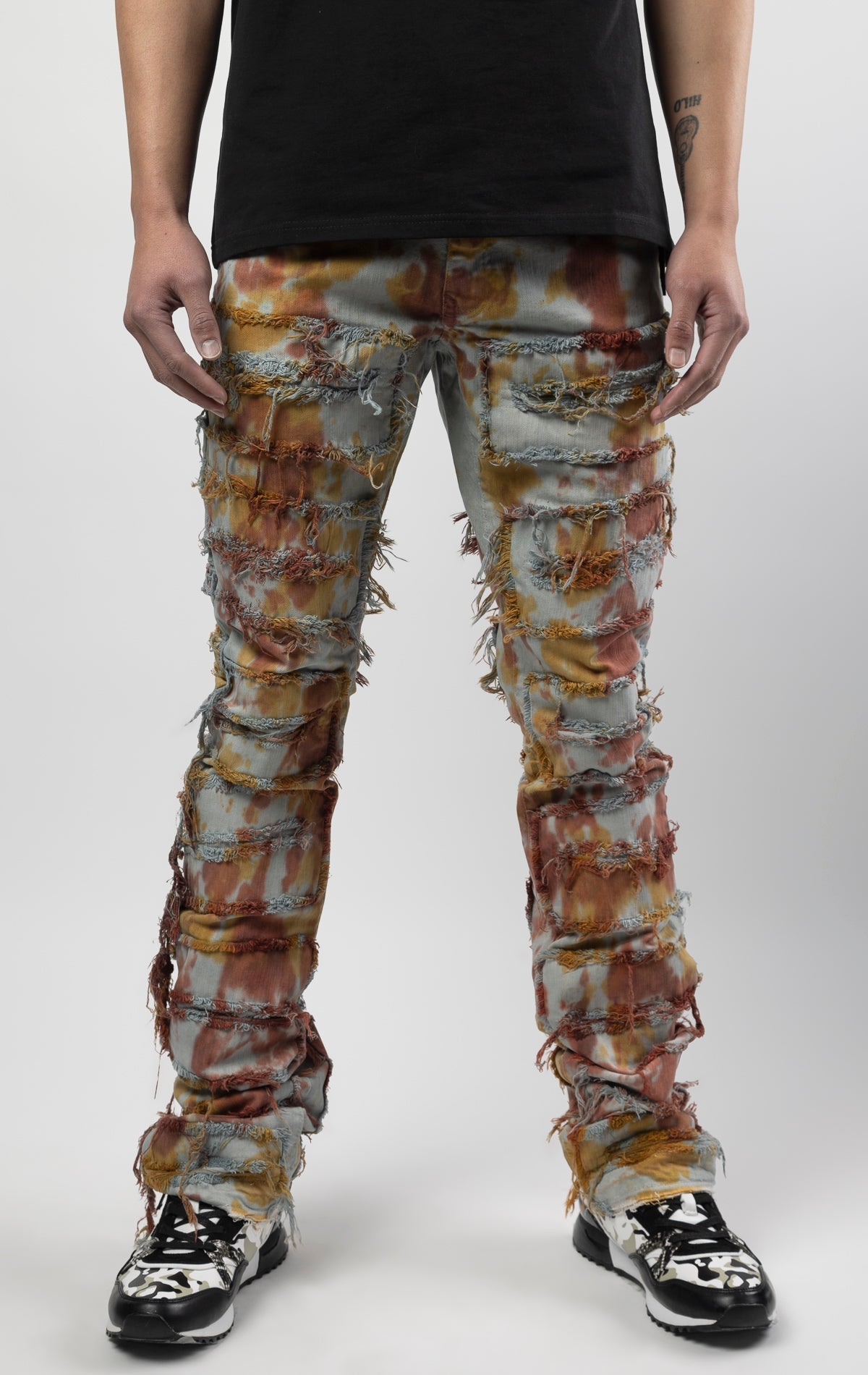 Jupiter texture bold, risk-taking flare pants feature a regular rise and extended length for maximum stacks. With a unique heavy wash and rip and repair design, complete with patches and abrasions, these skinny fit jeans are ready for adventure. Made from