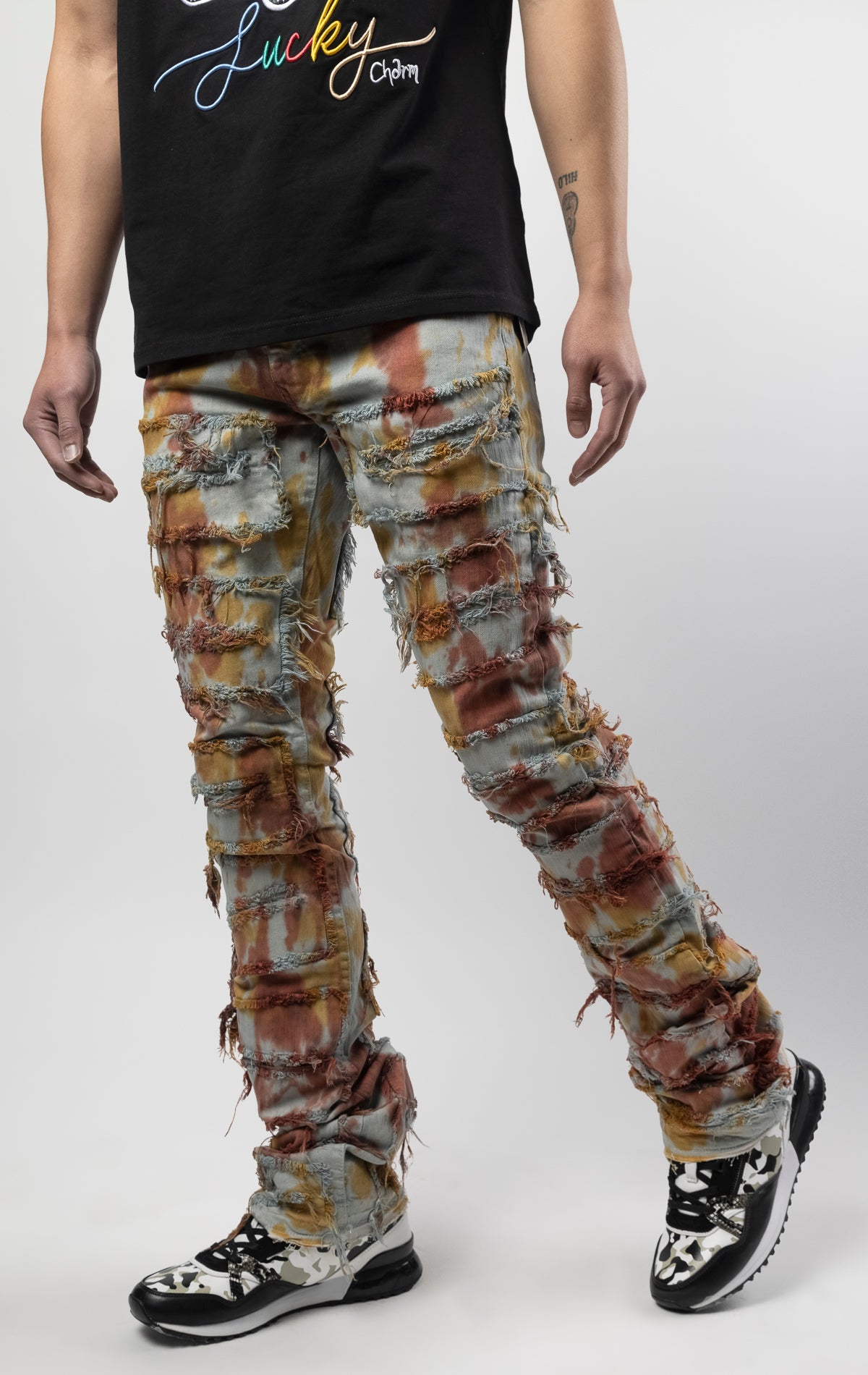 Jupiter texture bold, risk-taking flare pants feature a regular rise and extended length for maximum stacks. With a unique heavy wash and rip and repair design, complete with patches and abrasions, these skinny fit jeans are ready for adventure. Made from