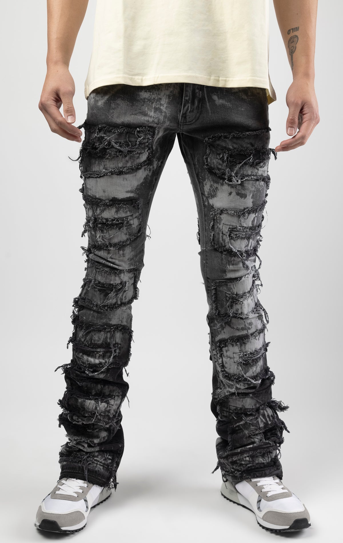 Mercury bold, risk-taking flare pants feature a regular rise and extended length for maximum stacks. With a unique heavy wash and rip and repair design, complete with patches and abrasions, these skinny fit jeans are ready for adventure. Made from 98% cot