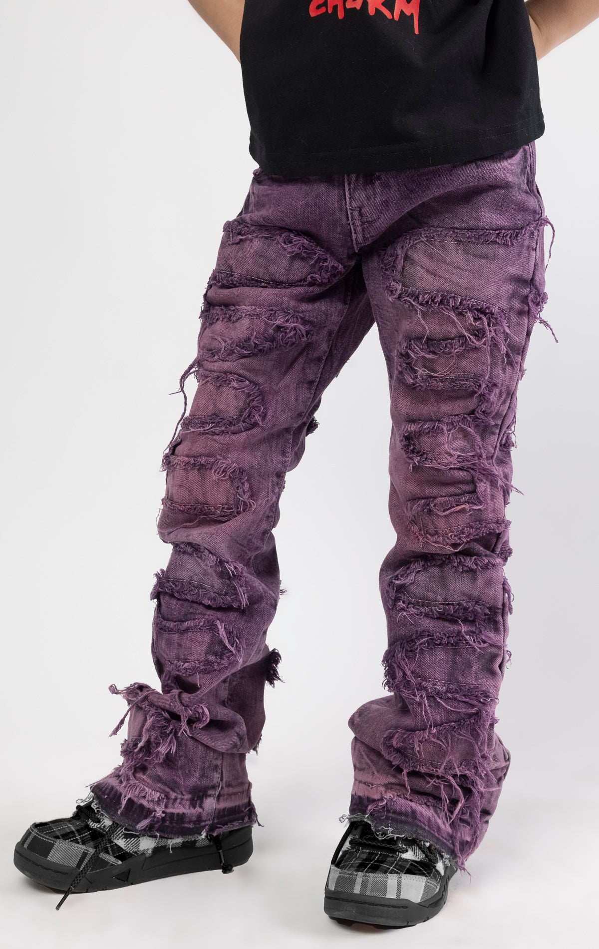 Skinny fit Regular rise denim with extended length for maximum stacks. Blush ombre wash with rip and repair design featuring self fabric backing. Patches and abrasions throughout for a trendy and edgy look.