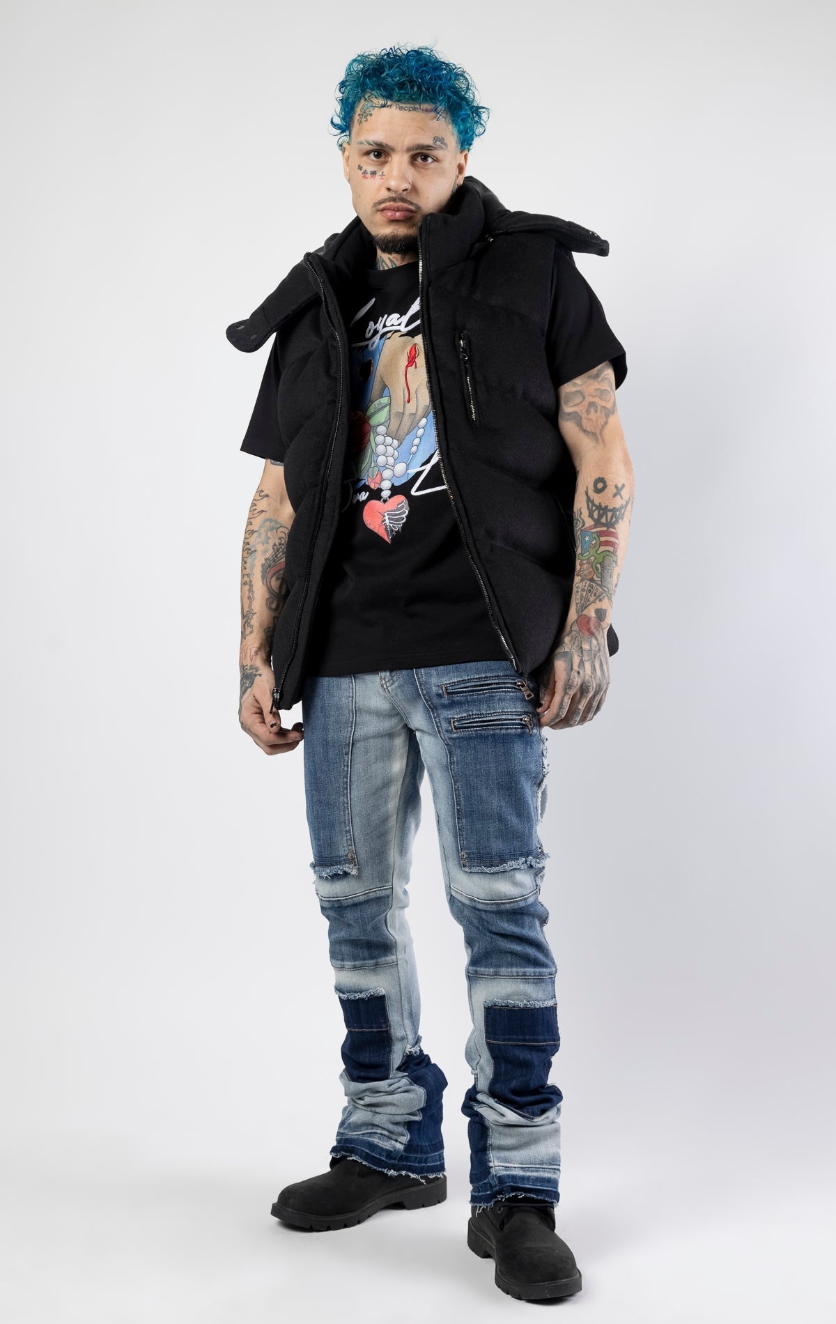 Black sleeveless puffer jacket with zip-up closure.