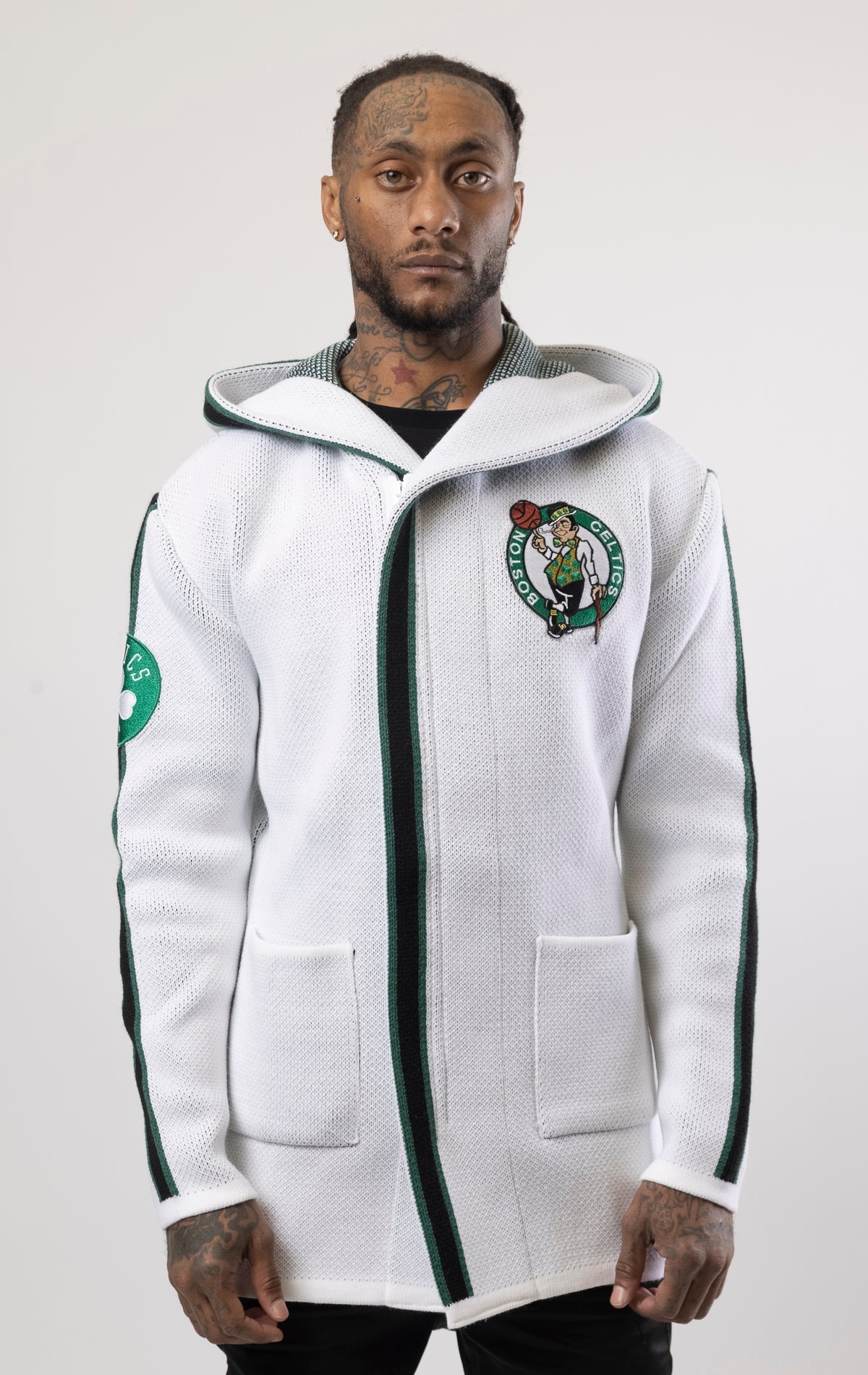 Upgrade your game day look with this Boston Celtics Cardigan Sweater. This cozy jacket is designed with a stylish three-quarter length and boasts bold team branding on the front, back, and sleeve. Complete with a full-zip closure, attached hood, and front