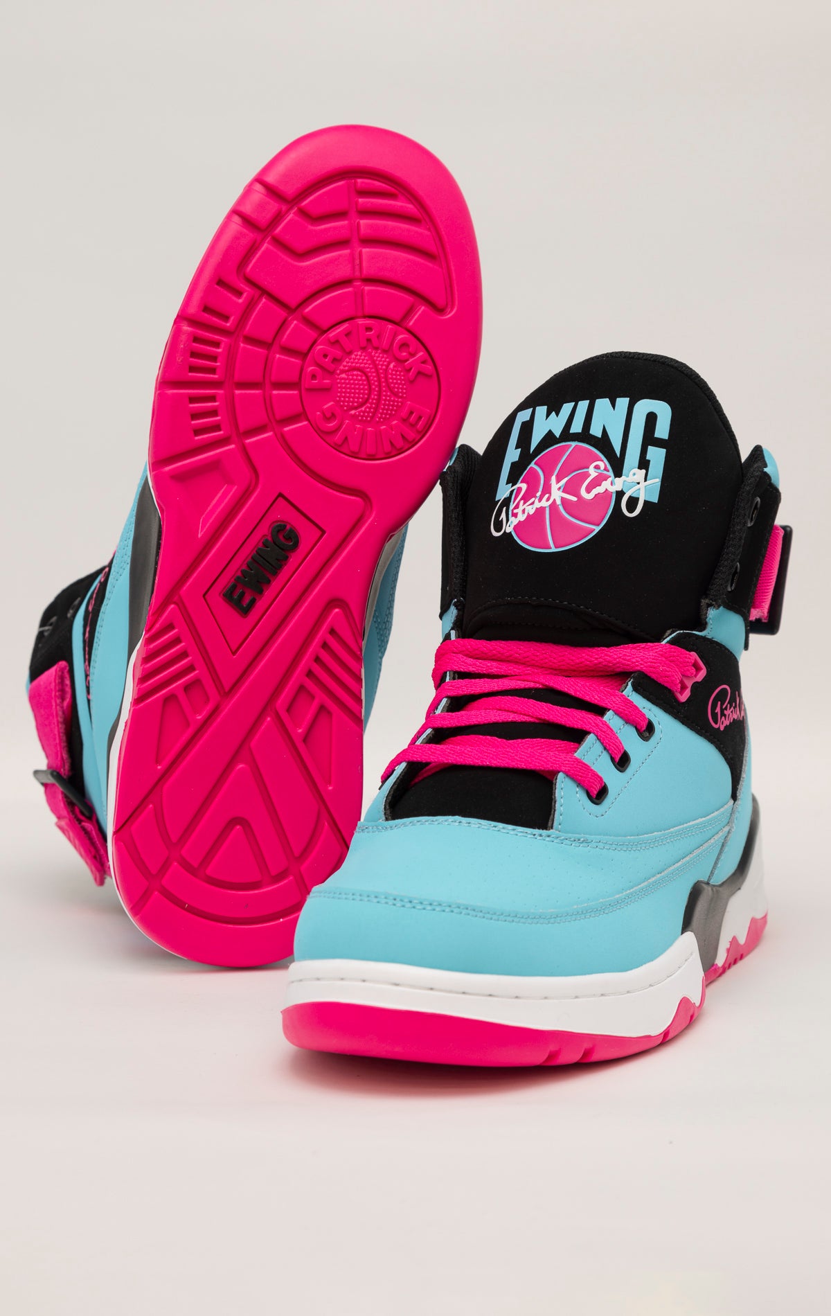 Blue, black, and pink high-top basketball sneakers by Patrick Ewing Athletics. Leather upper, padded collar, and Ewing Athletics logo on the tongue