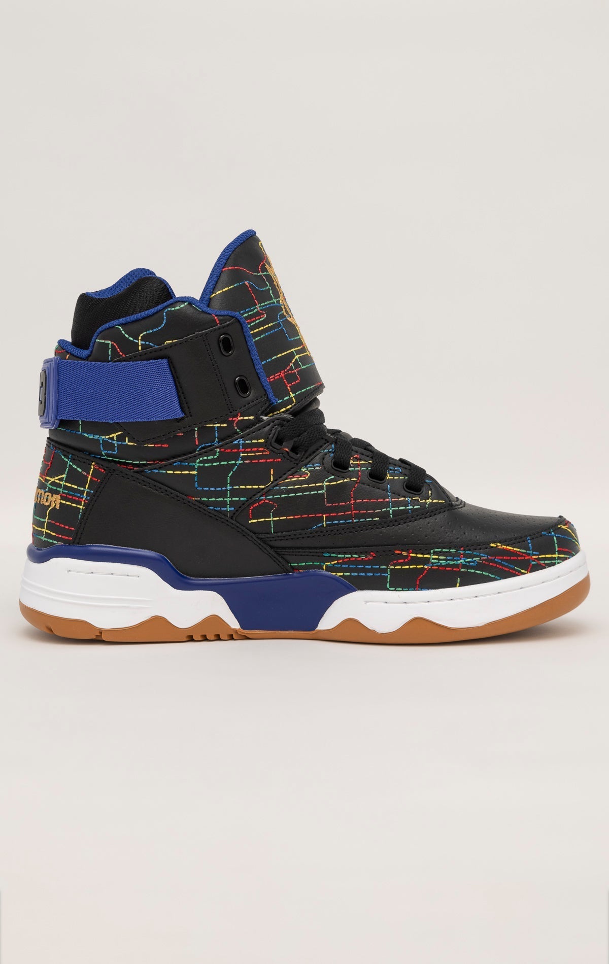 Multi high-top sneakers by Ewing Athletics with a collaboration with rapper Common. Features a cartoon graphic on the side and multicolored accents.