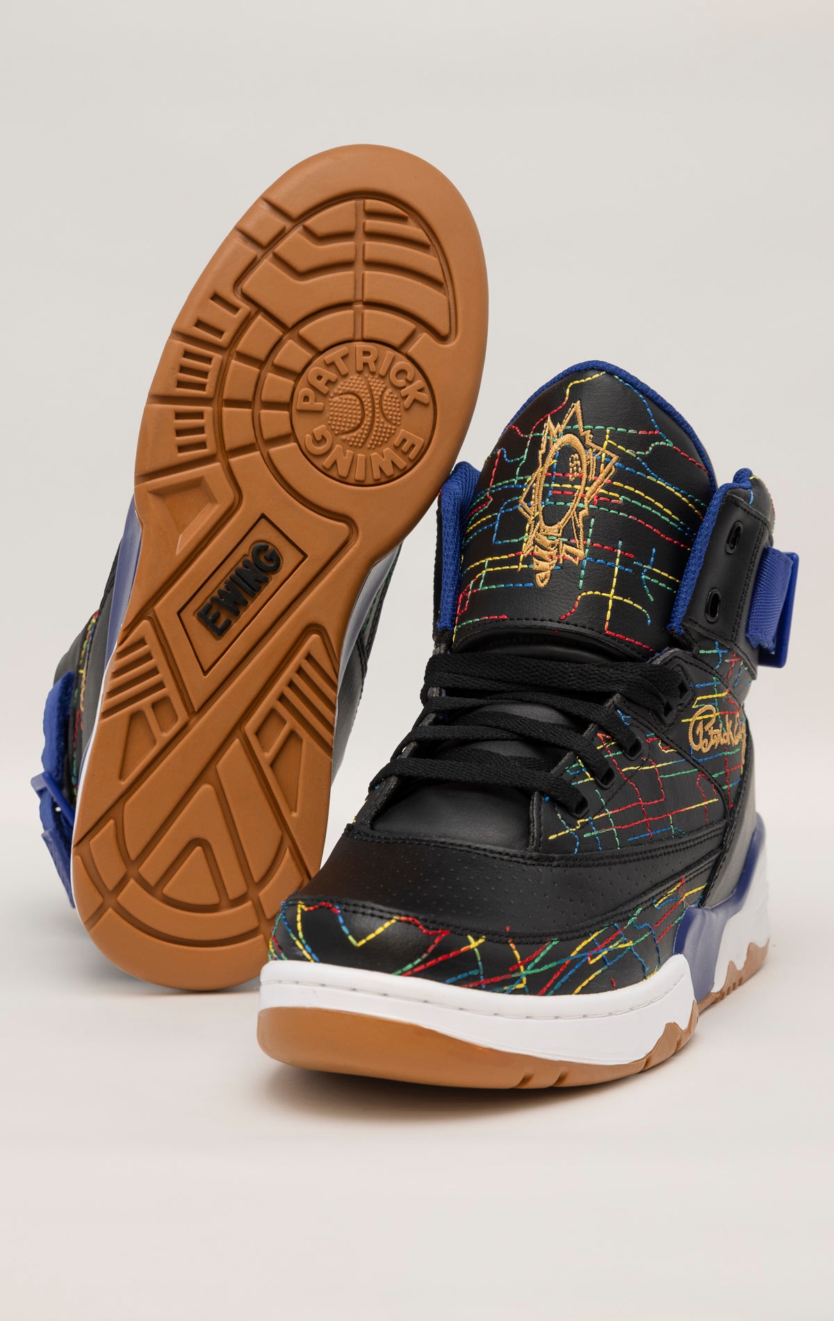 Multi high-top sneakers by Ewing Athletics with a collaboration with rapper Common. Features a cartoon graphic on the side and multicolored accents.