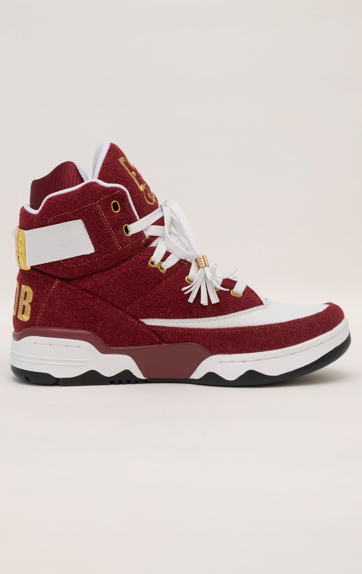 Burgundy and white high-top sneakers with gold accents, co-branded by Ewing Athletics and Ol' Dirty Bastard (ODB) of the Wu-Tang Clan.
