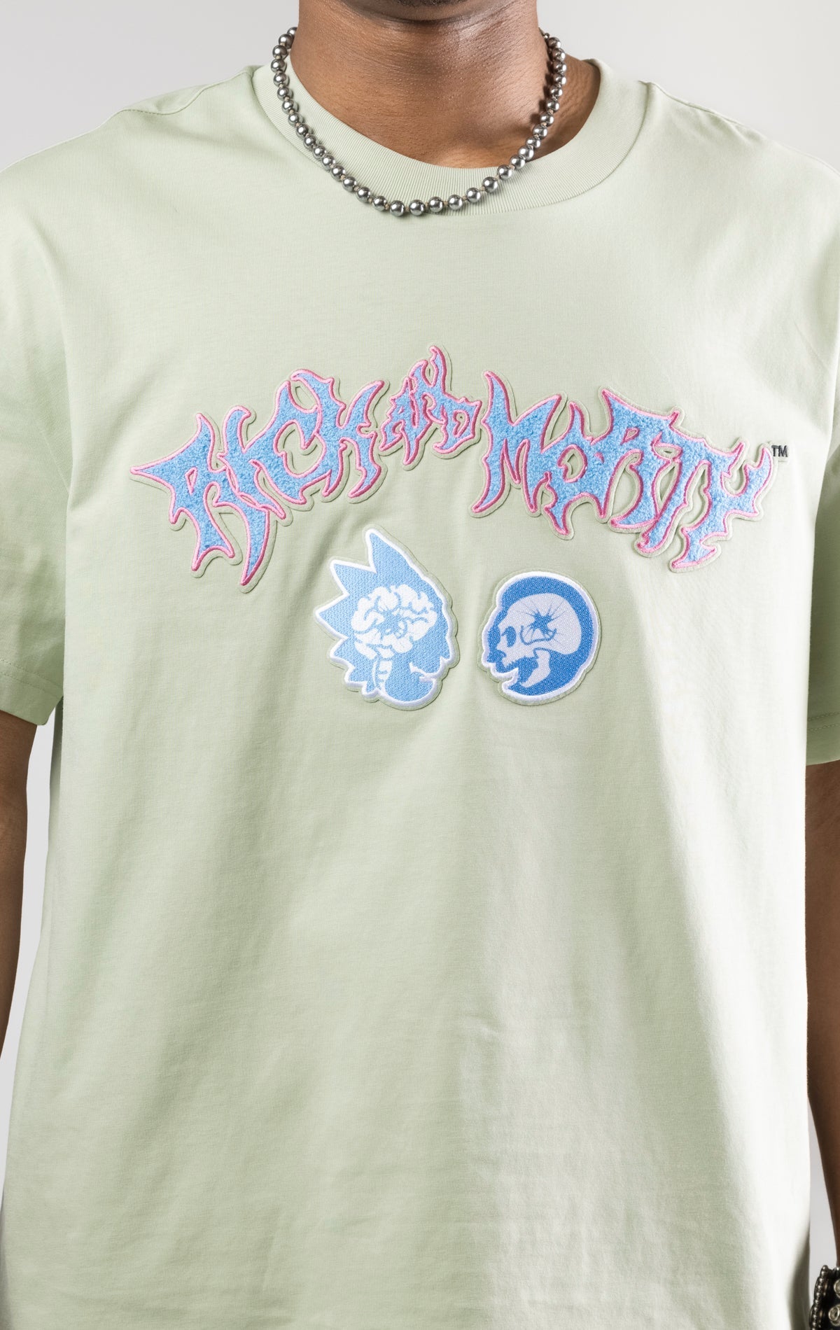 Rick And Morty graphic t-shirt in a relaxed fit with dropped shoulders and a crew neck. The shirt features heat-sealed graphics and a chenille applique with embroidered details.