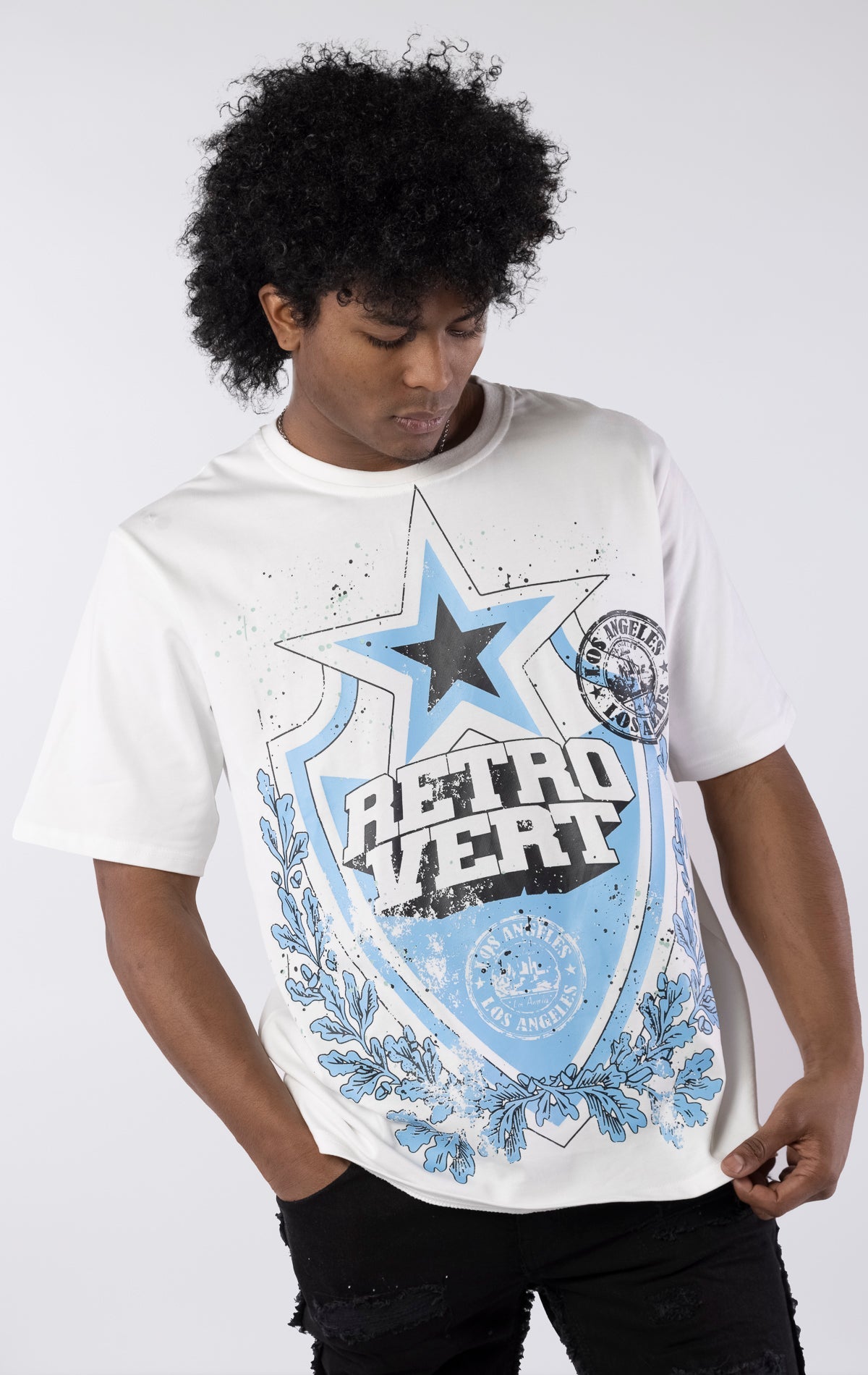 White organic cotton t-shirt with front and back graphics, ribbed collar, and slightly oversized fit.