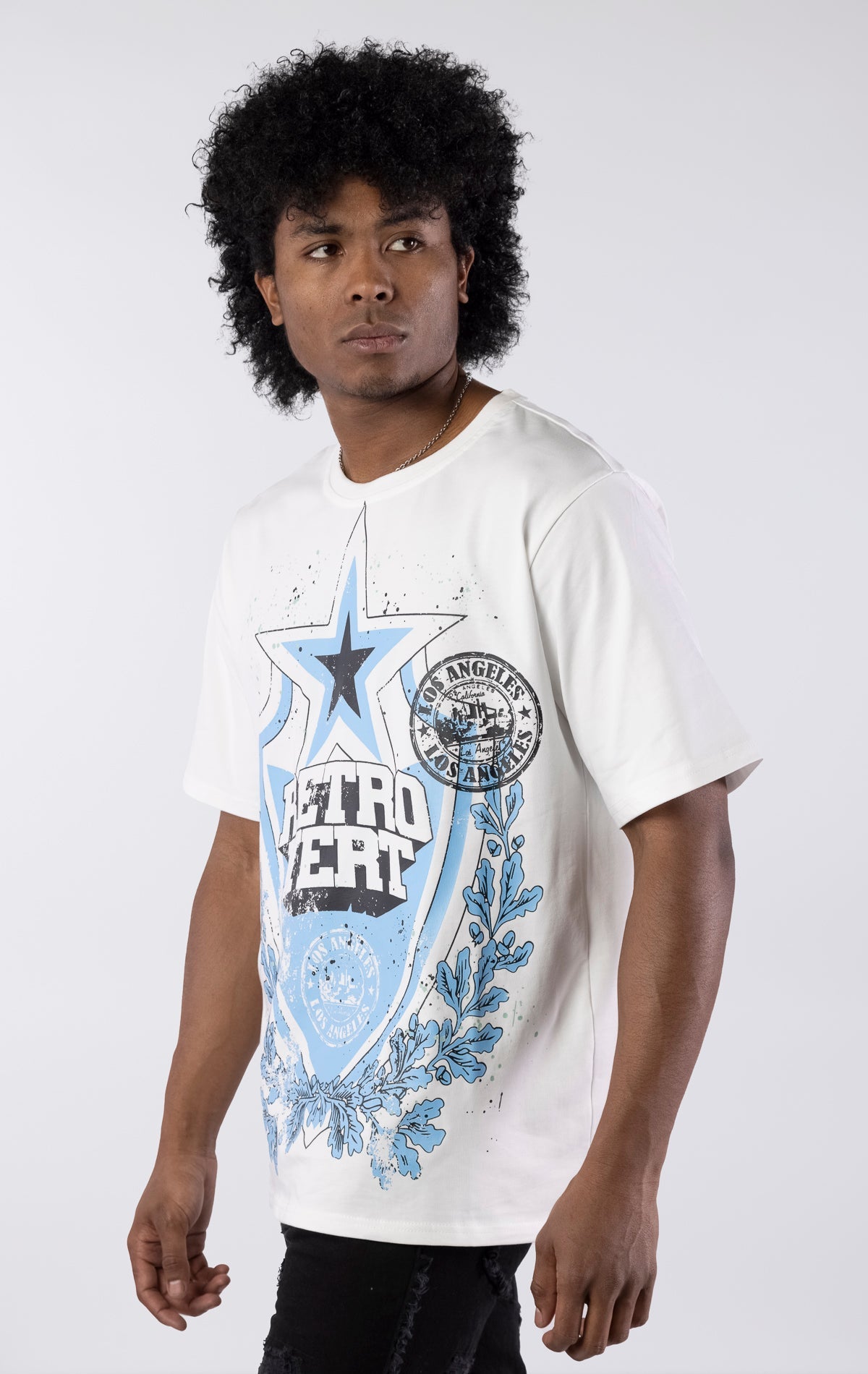 White organic cotton t-shirt with front and back graphics, ribbed collar, and slightly oversized fit.