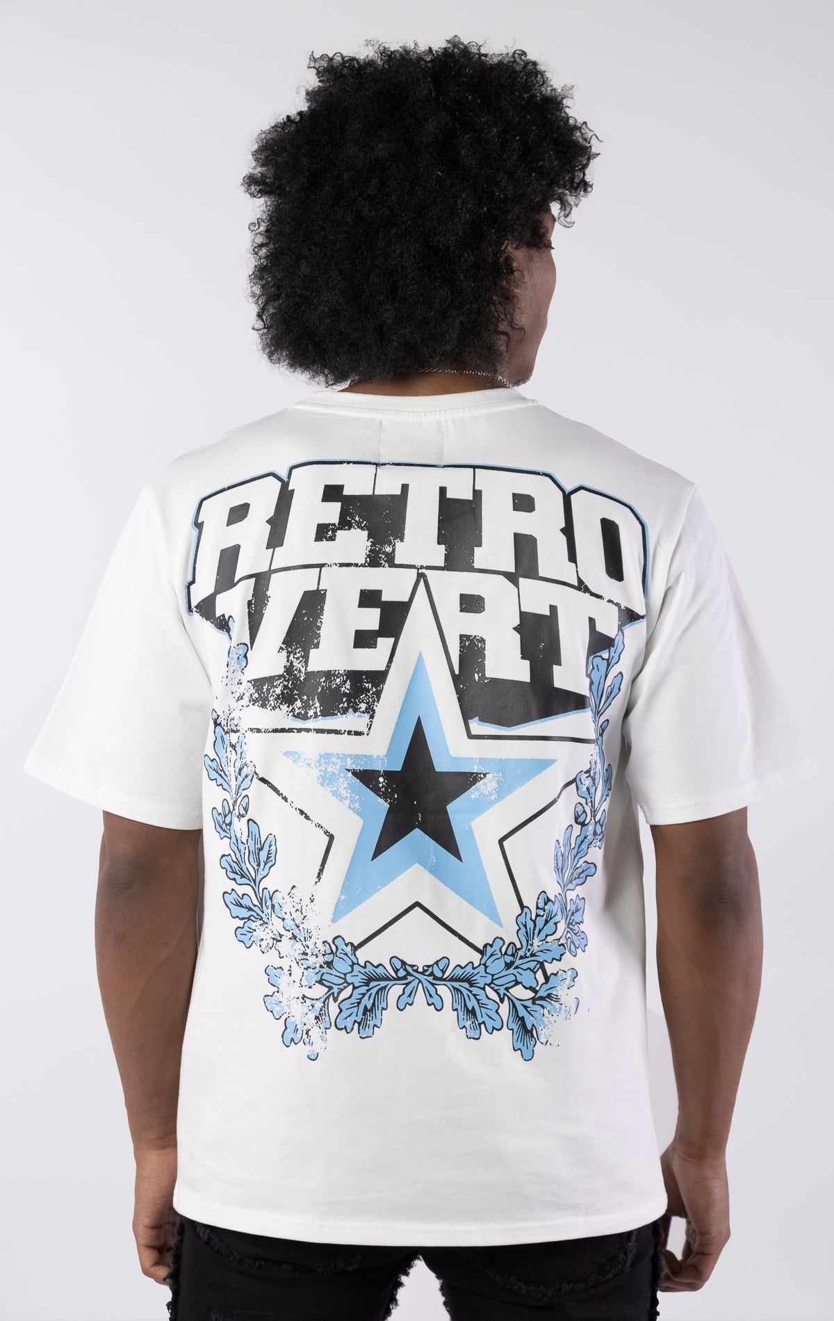 White organic cotton t-shirt with front and back graphics, ribbed collar, and slightly oversized fit.