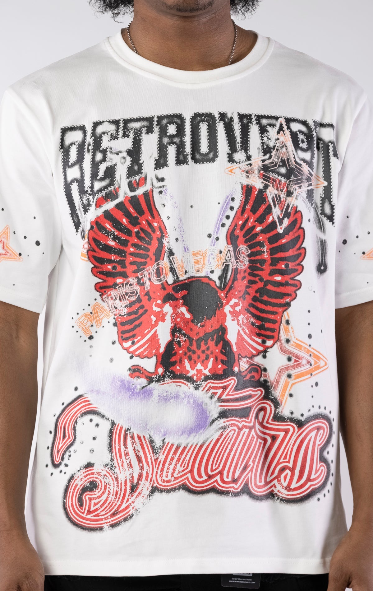 White heavyweight organic cotton t-shirt with front and back graphics, ribbed collar, and a relaxed oversized fit.