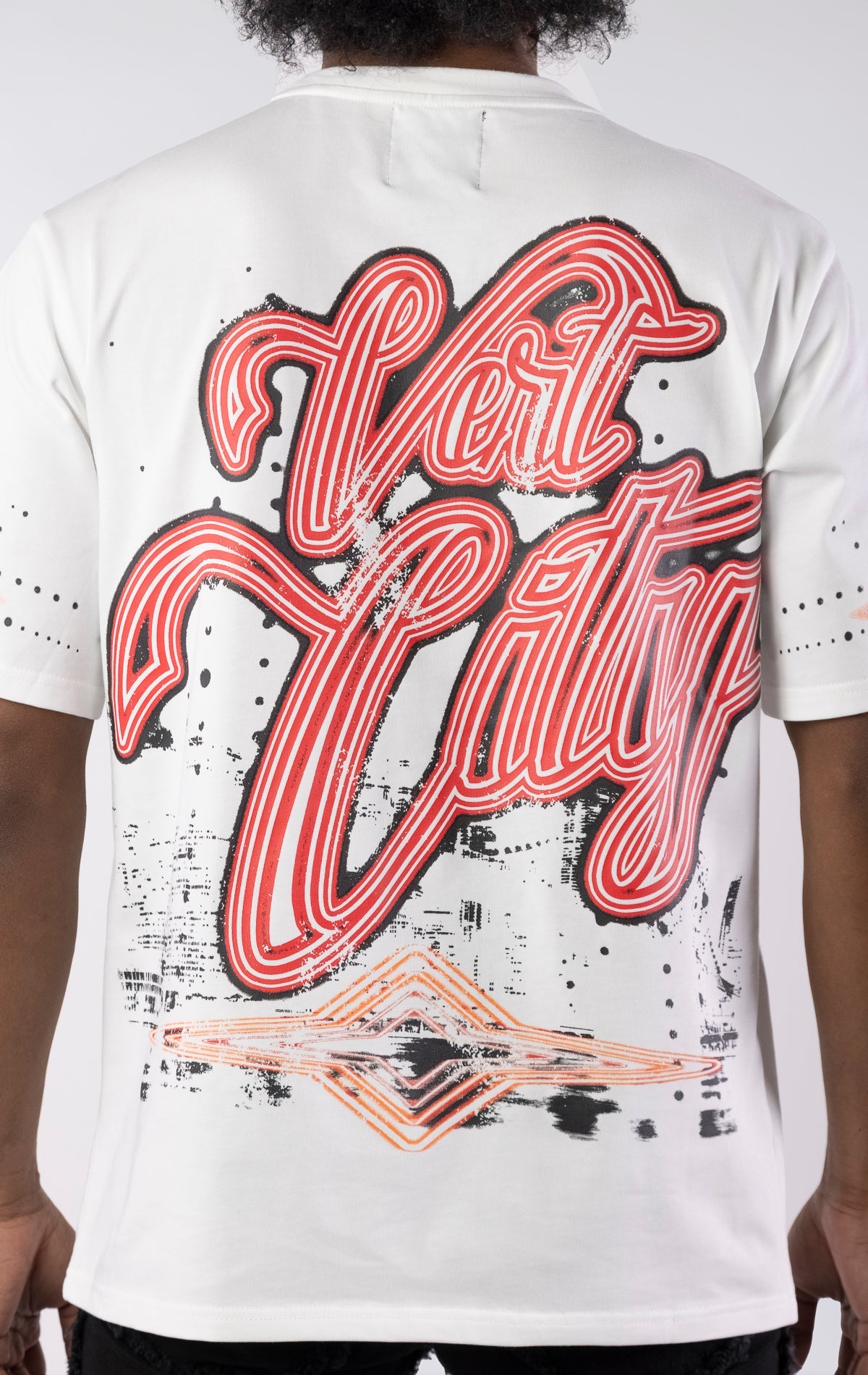 White heavyweight organic cotton t-shirt with front and back graphics, ribbed collar, and a relaxed oversized fit.