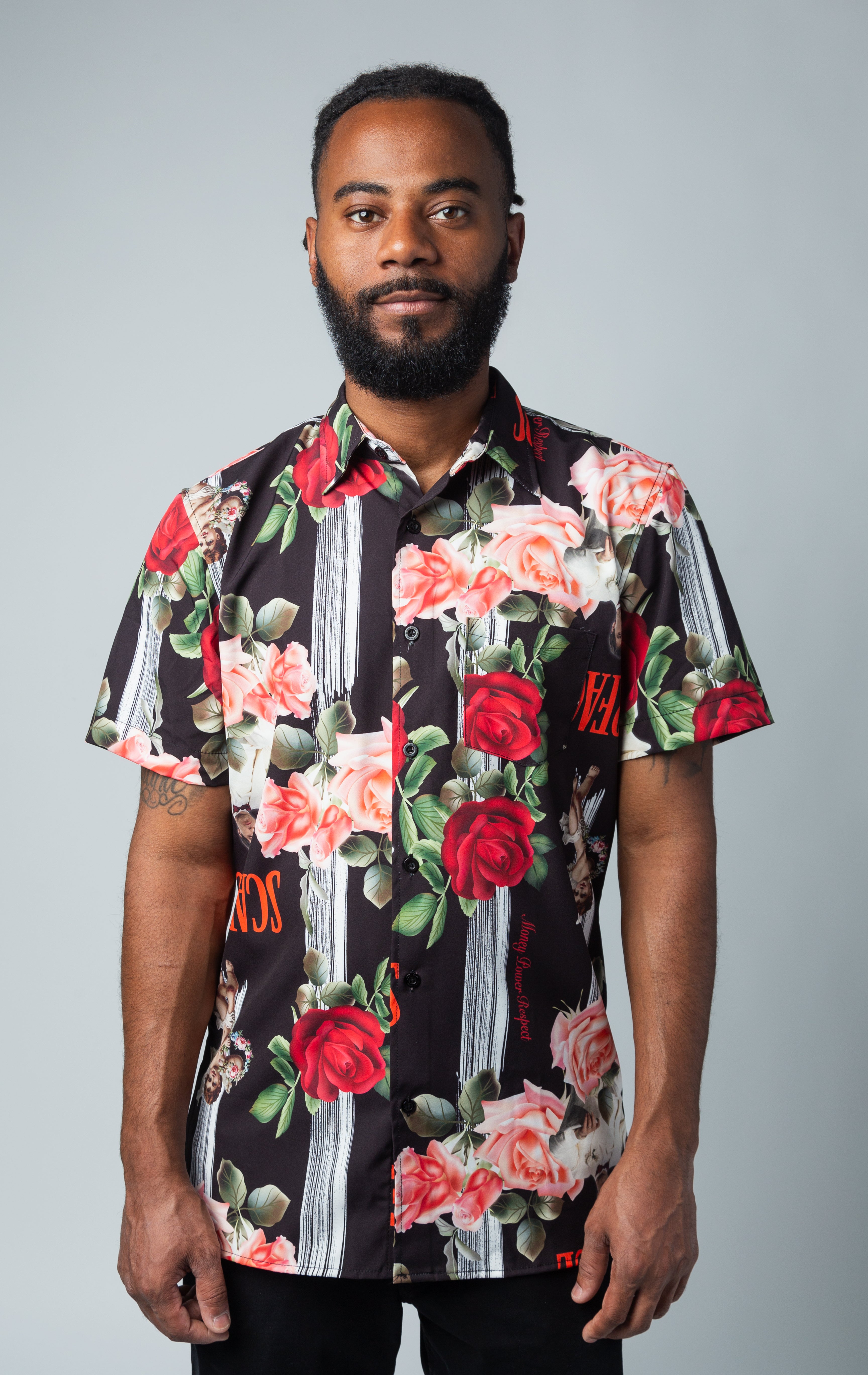 Scarface all-over print, classic button-up shirt style with a spread collar and short sleeves.