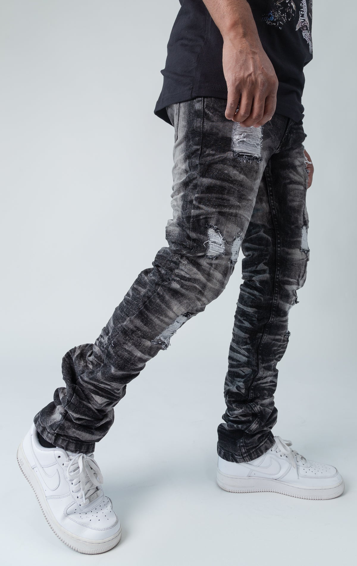 Black ripped low-waisted slim jeans.