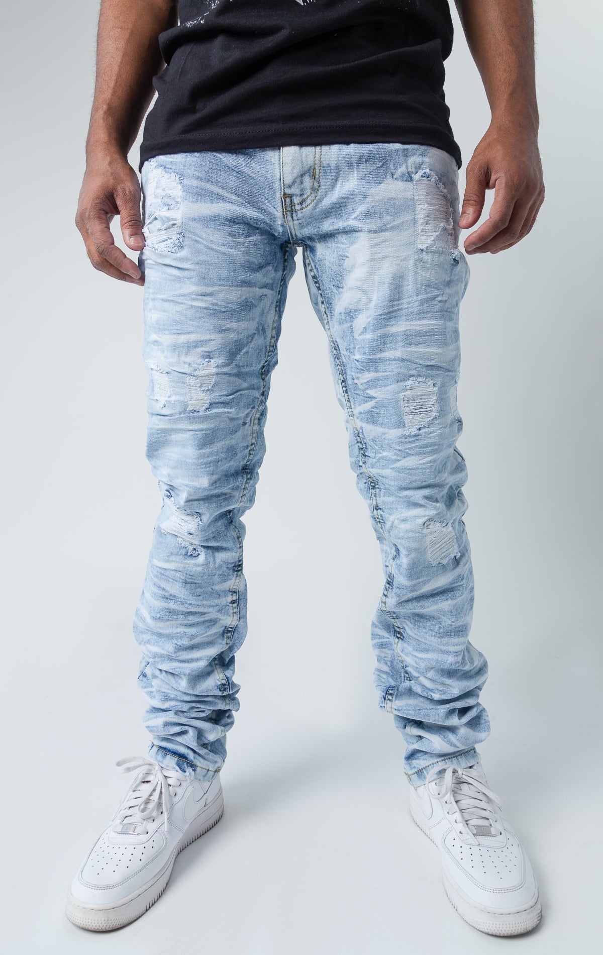 Ice blue ripped low-waisted and slim jeans.