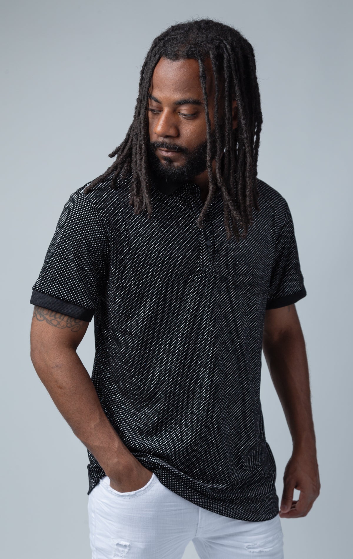 Men's Shiny Rush black short sleeve polo shirt with gold and silver glittery accents.