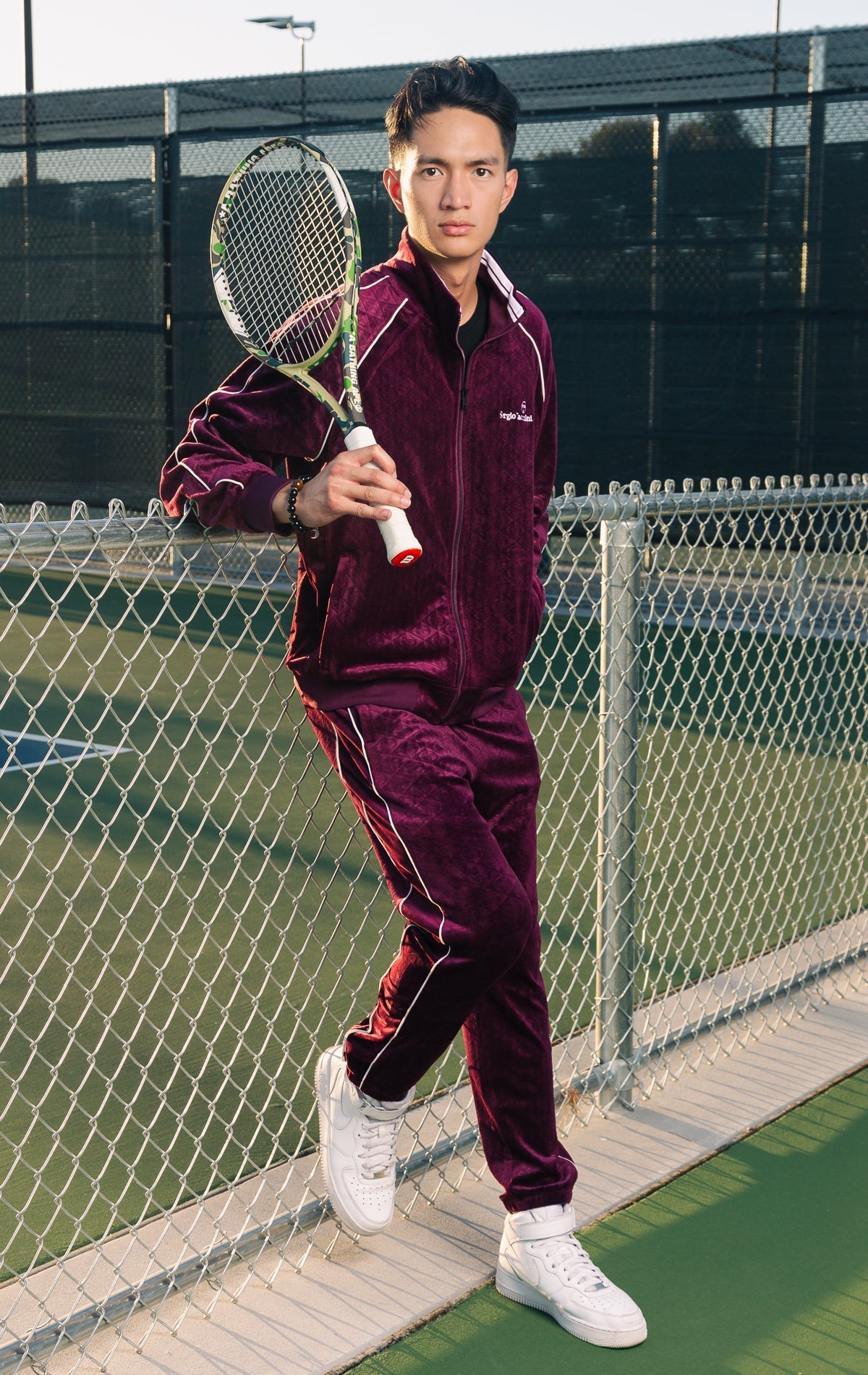 Wine premium velour tracksuit featuring a Sergio Tacchini logo embroidered