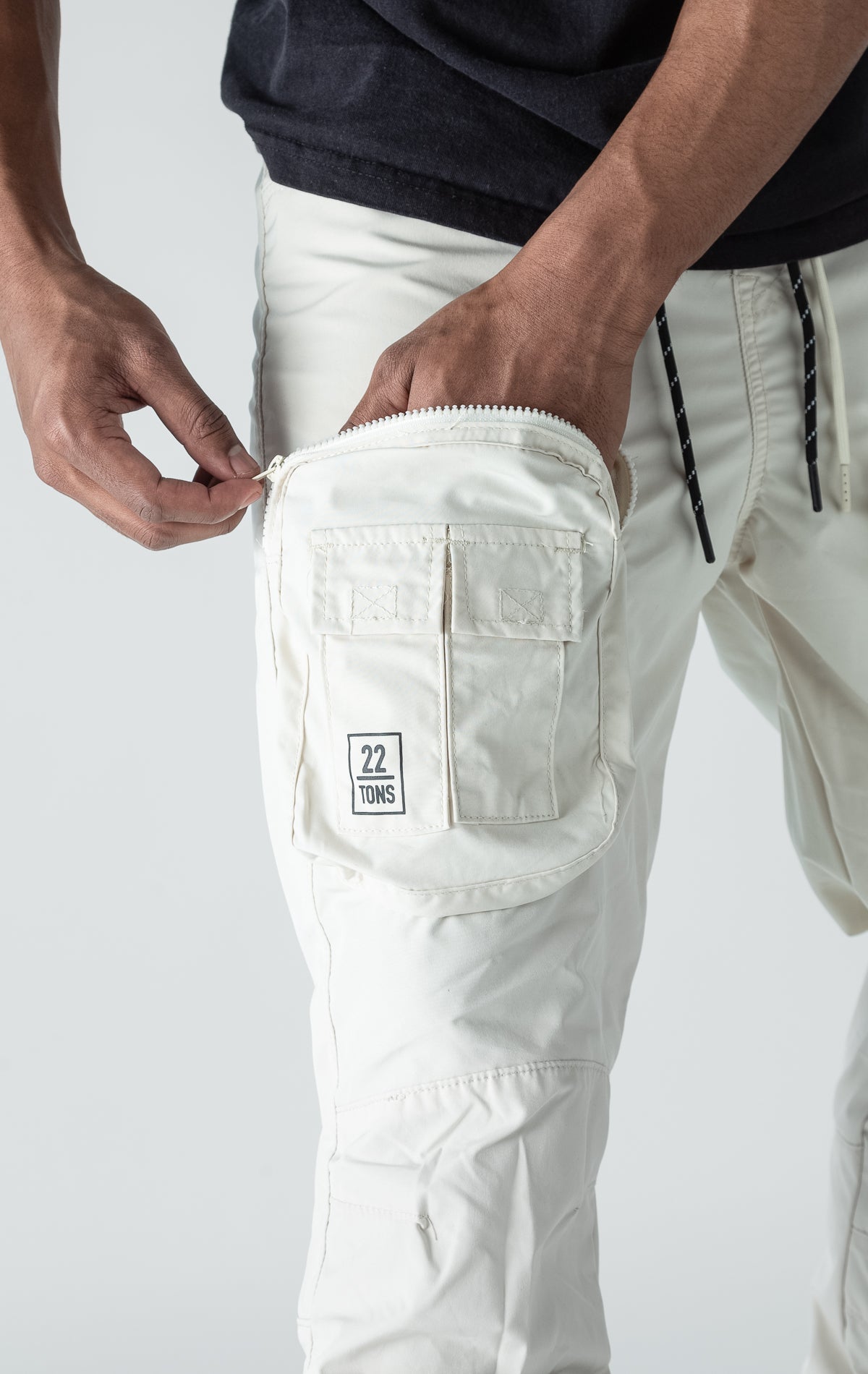 Oatmeal open bottom windbreaker utility joggers.