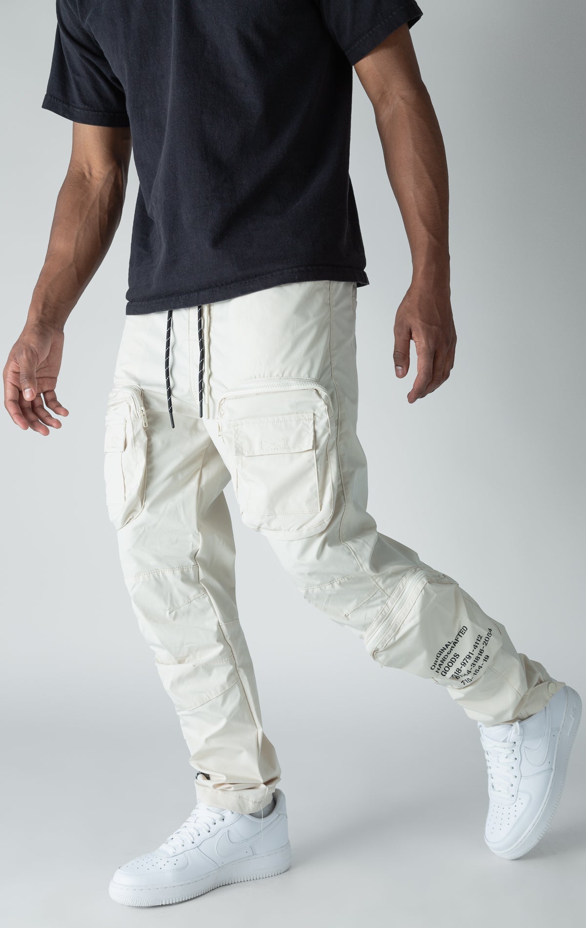 Oatmeal open bottom windbreaker utility joggers.