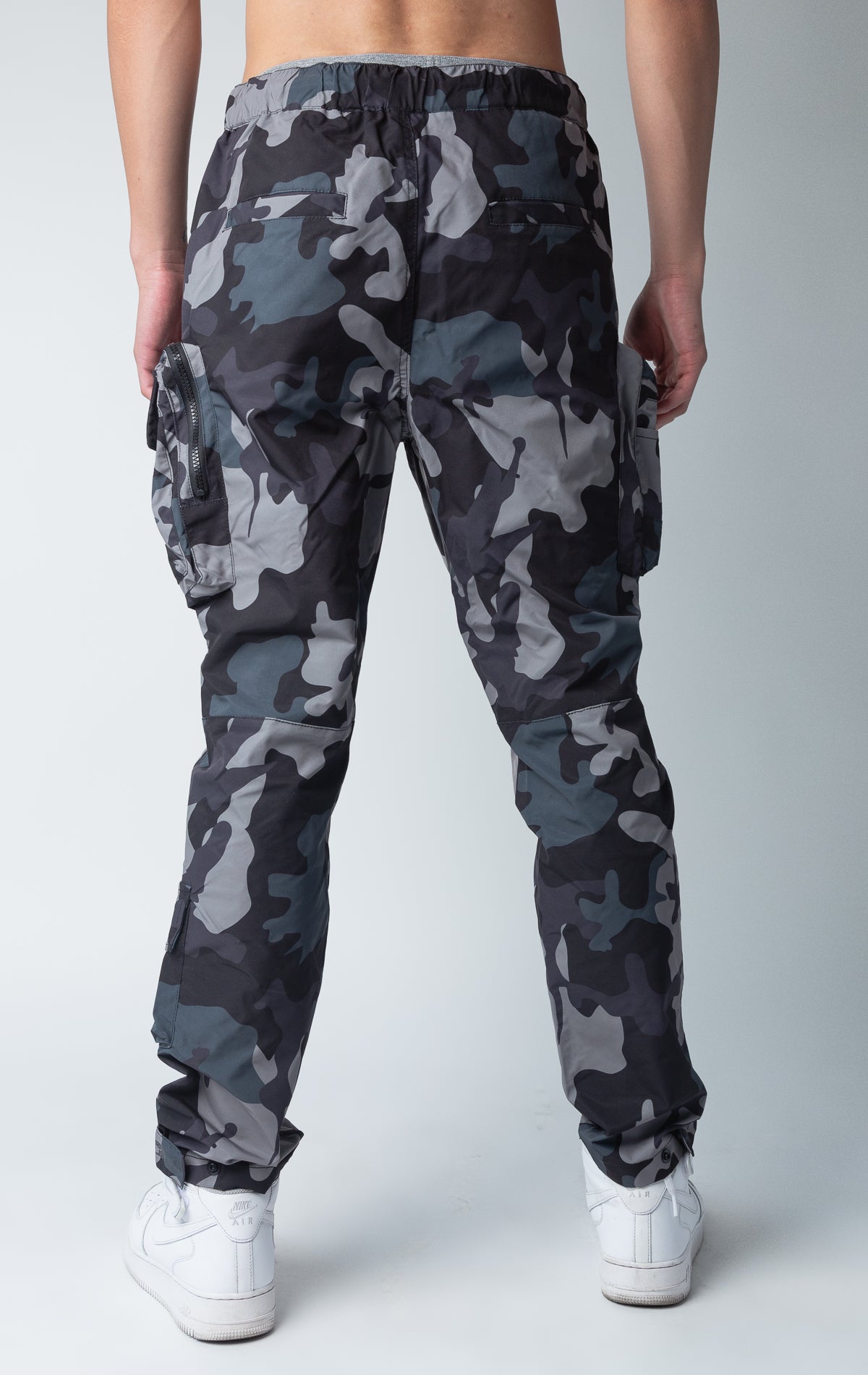 Camo windbreaker utility pants, sleek fit with an open bottom jogger style