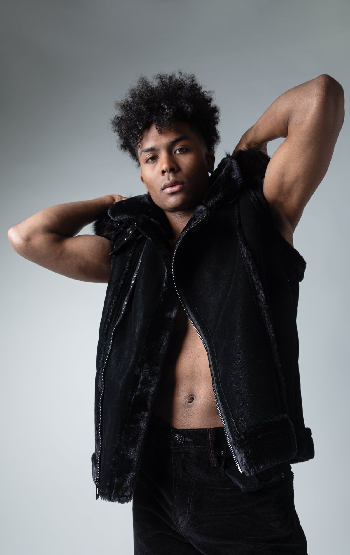 Sherpa-Lined Faux Suede Vest in black