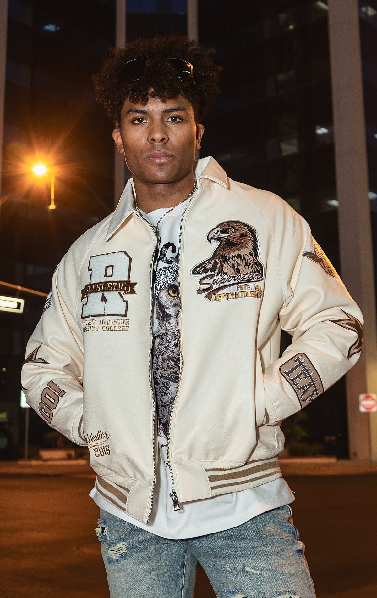 Cream U.S.A. Varsity Jacket with patches, zip-up front, and quilted lining