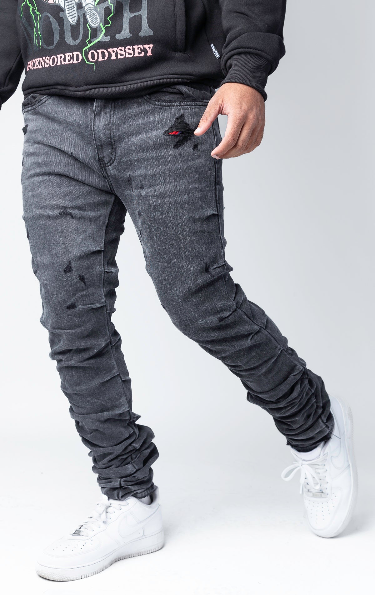 stacked skinny jeans in black wash
