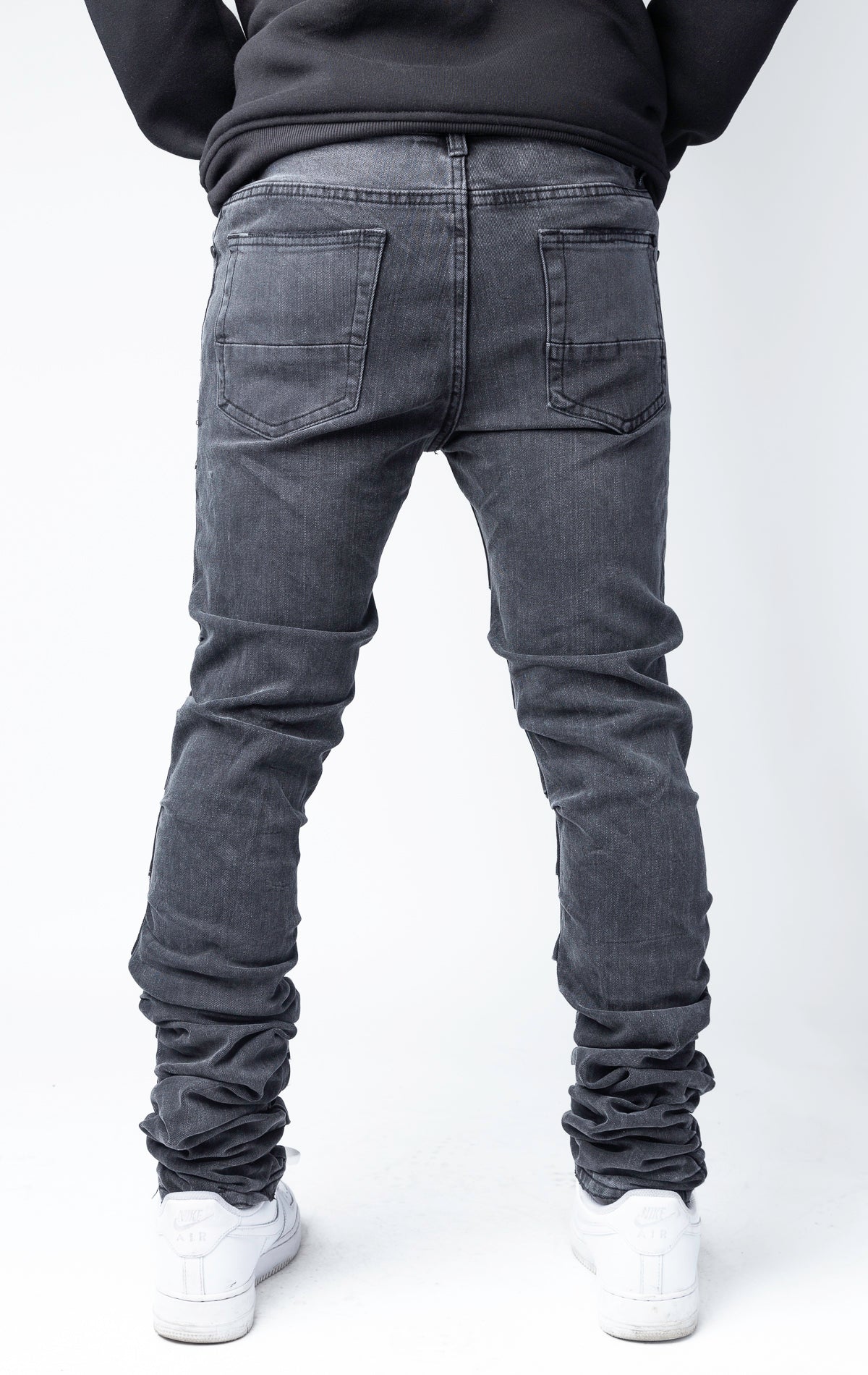 stacked skinny jeans in black wash