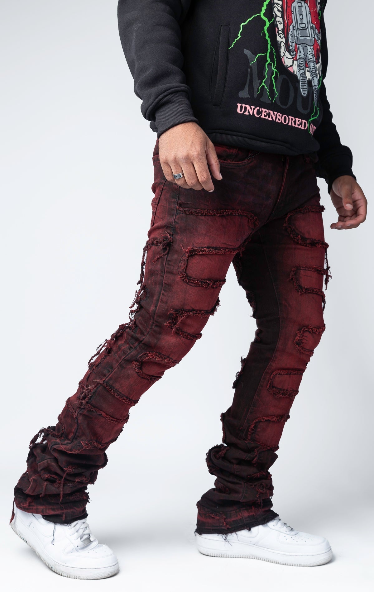 Magma distressed and stacked flare jeans featuring an ombre wash and ripped details