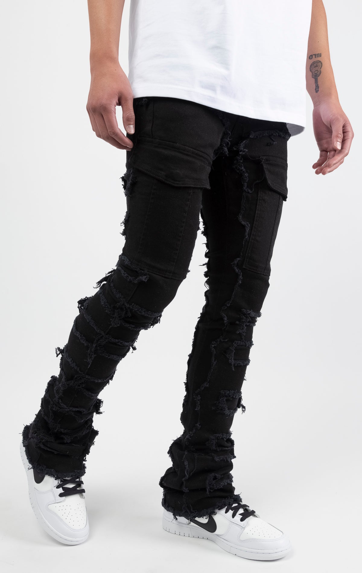 Black Fray panel with stitch design, stacked cargo jeans with classic 5 pockets and flared bottom leg.