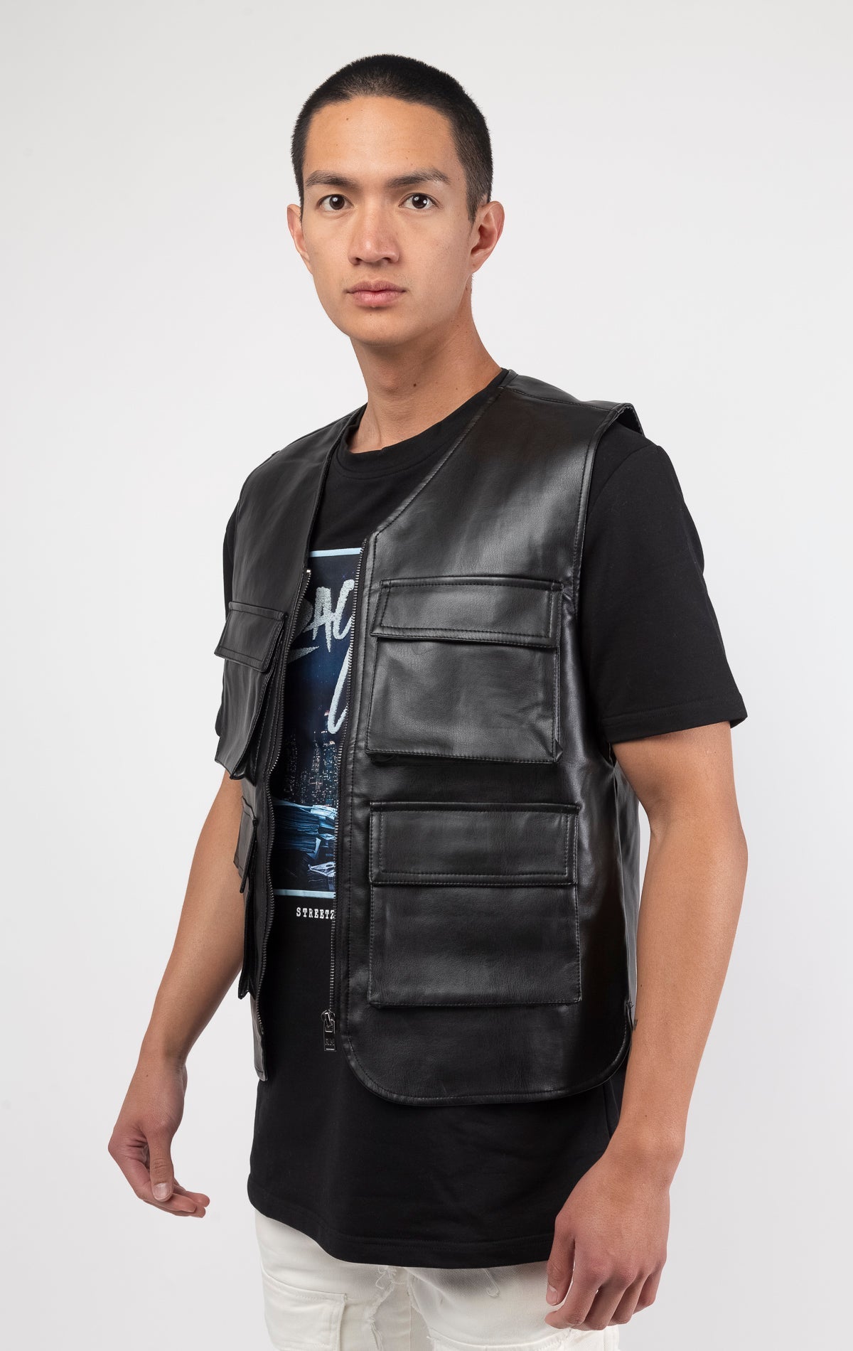 Black faux leather cargo vest crafted from 100% PU, durable and cruelty-free. Featuring a 100% Polyester Linin.