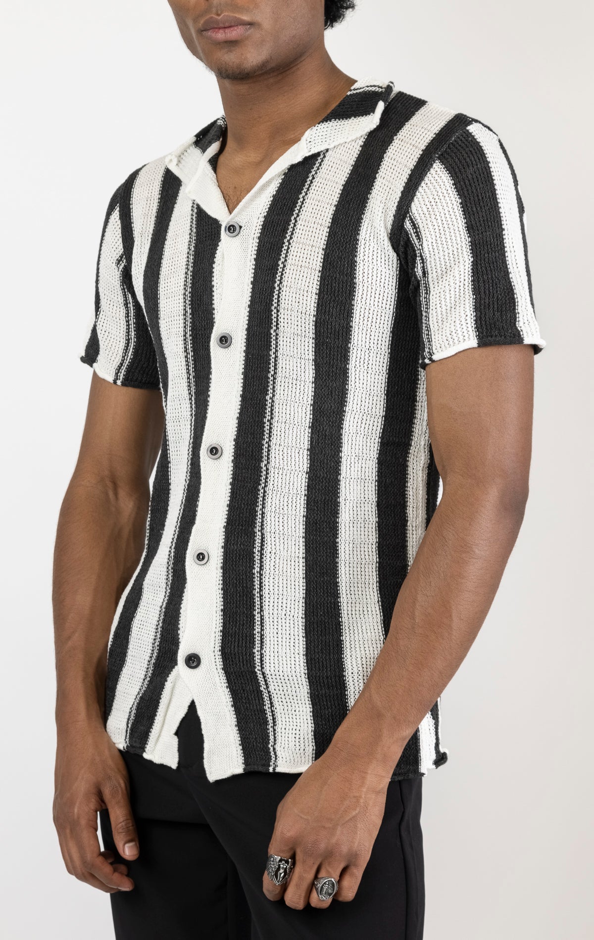 Men's openwork knit polo tee. The polo tee is made from a high-quality openwork knit fabric (50% cotton, 50% acrylic) and features a tailored fit, a classic polo collar with buttons, and short sleeves with intricate openwork detailing throughout the fabri