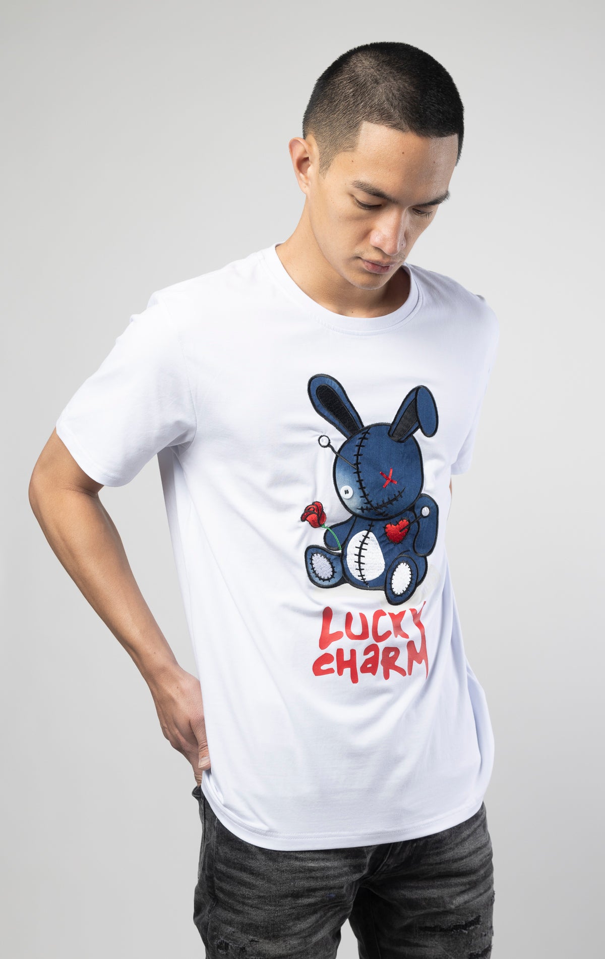 Update your wardrobe with this trendy short sleeves crewneck featuring a lucky denim bunny graphic on the front.