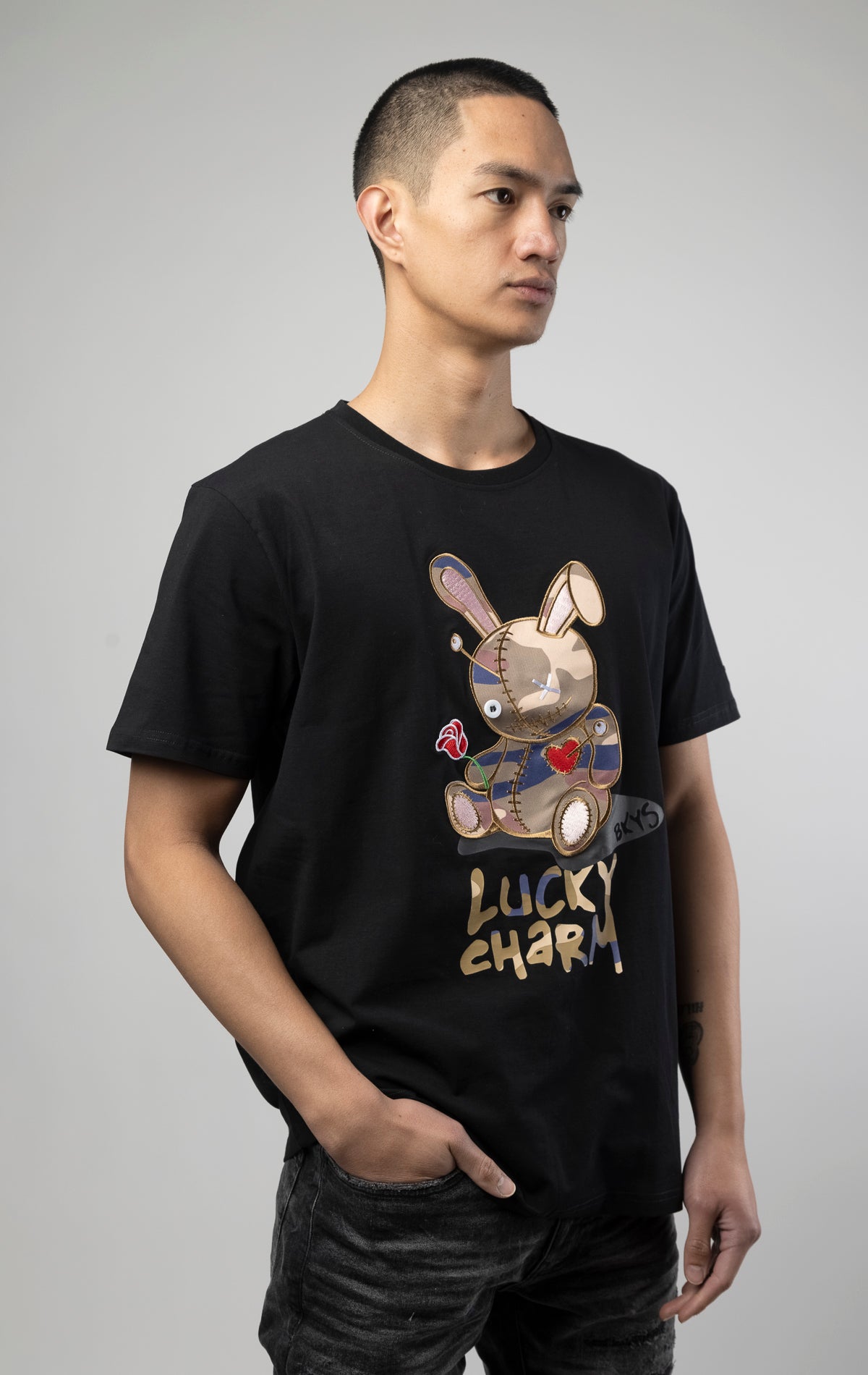 Beige camo luck charm bunny print on black tshirt
