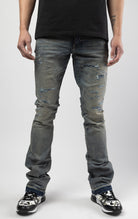 Death valley jeans with 3D wrinkles, rip and repair design