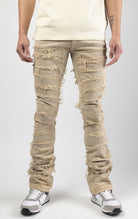 Cream bold, risk-taking flare pants feature a regular rise and extended length for maximum stacks. With a unique heavy wash and rip and repair design, complete with patches and abrasions, these skinny fit jeans are ready for adventure. Made from 98% cotton and 2% Lycra