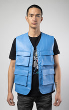 Blue faux leather cargo vest crafted from 100% PU, durable and cruelty-free. Featuring a 100% Polyester Linin.
