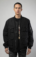 Men's utility bomber jacket with 5 pockets on the front (Velcro, zip, and snap closure), ribbed collar and cuffs, as well as a sleeve pocket 