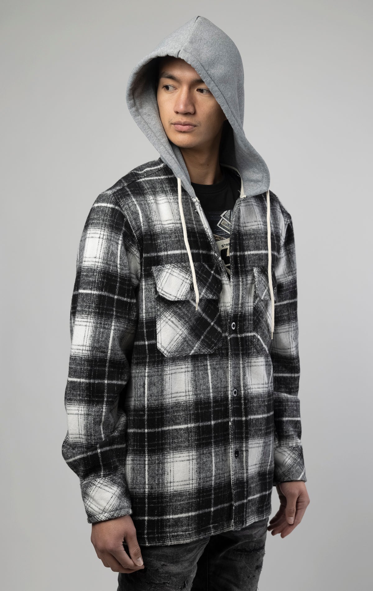 Male model wearing black and white Hooded Flannel Overshirt
