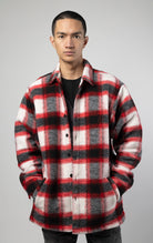 Model wearing Red, white and black oversized button up shirt made from soft, felted fabric