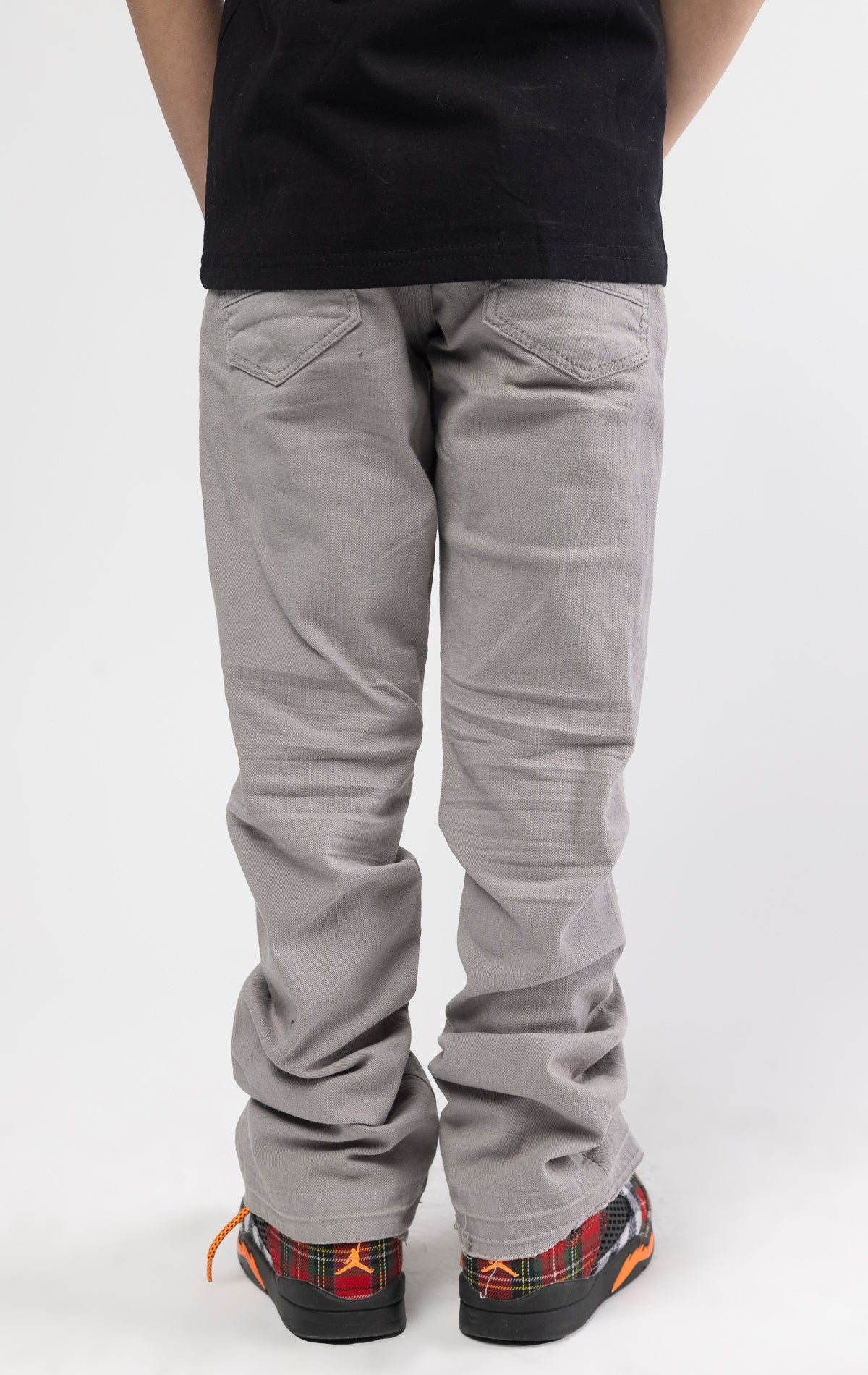 Grey Extended length flare pants for maximum stacks.