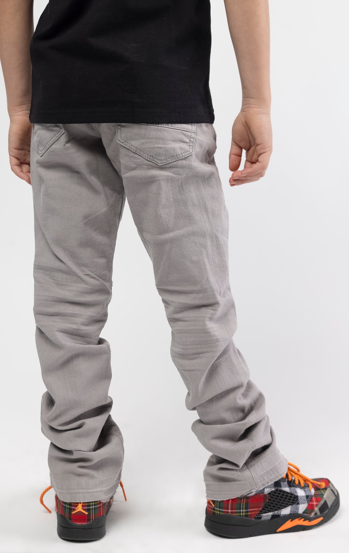 Grey Extended length flare pants for maximum stacks.