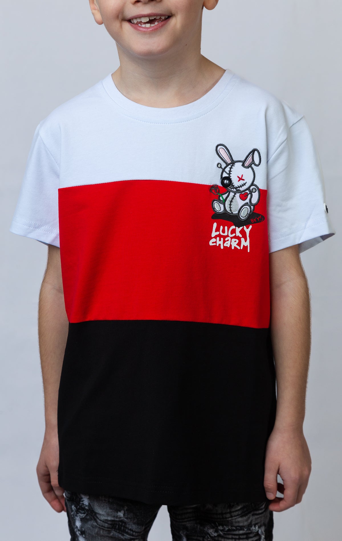 BKYS LITTLE CHARMER-KIDS presents a white, red and black striped t-shirt for kids with a charming bunny on the left chest.