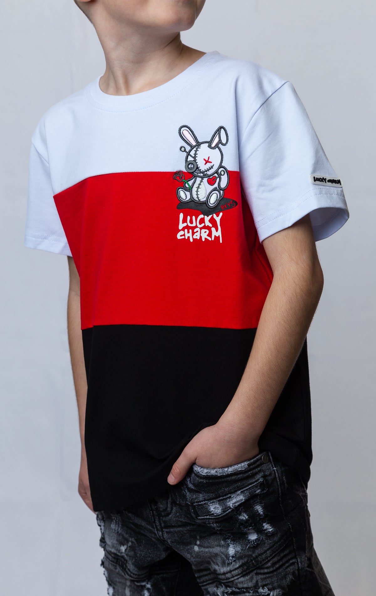 BKYS LITTLE CHARMER-KIDS presents a white, red and black striped t-shirt for kids with a charming bunny on the left chest.
