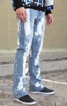 Indigo stacked flare jeans with a bleach wash finish