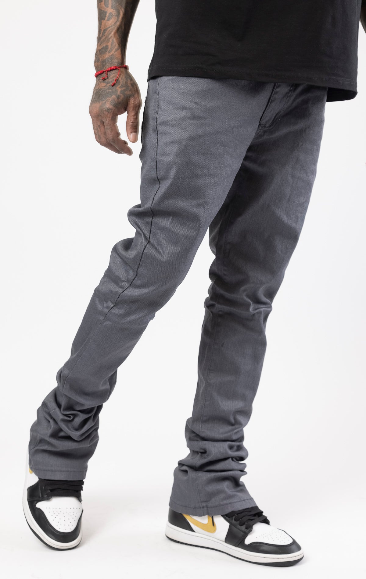 Grey Glossy denim with a regular rise, flared stacked jeans