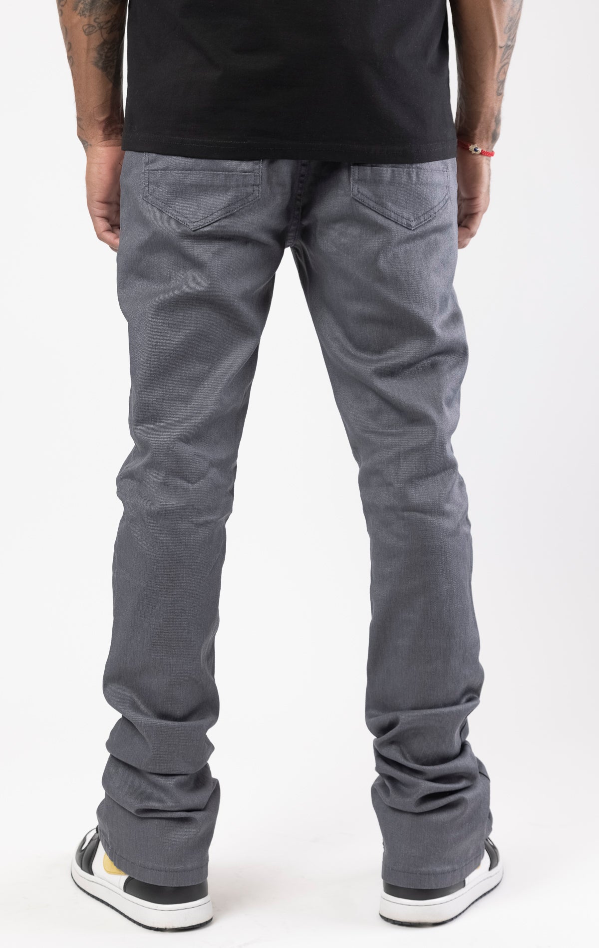 Grey Glossy denim with a regular rise, flared stacked jeans