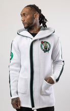 Upgrade your game day look with this Boston Celtics Cardigan Sweater. This cozy jacket is designed with a stylish three-quarter length and boasts bold team branding on the front, back, and sleeve. Complete with a full-zip closure, attached hood, and front pockets, this knit sweater offers both comfort and style.