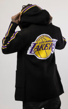 black LA LAKERS Cardigan Sweater. This cozy jacket is designed with a stylish three-quarter length and boasts bold team branding on the front, back, and sleeve. Complete with a full-zip closure, attached hood, and front pockets, this knit sweater offers both comfort and style.