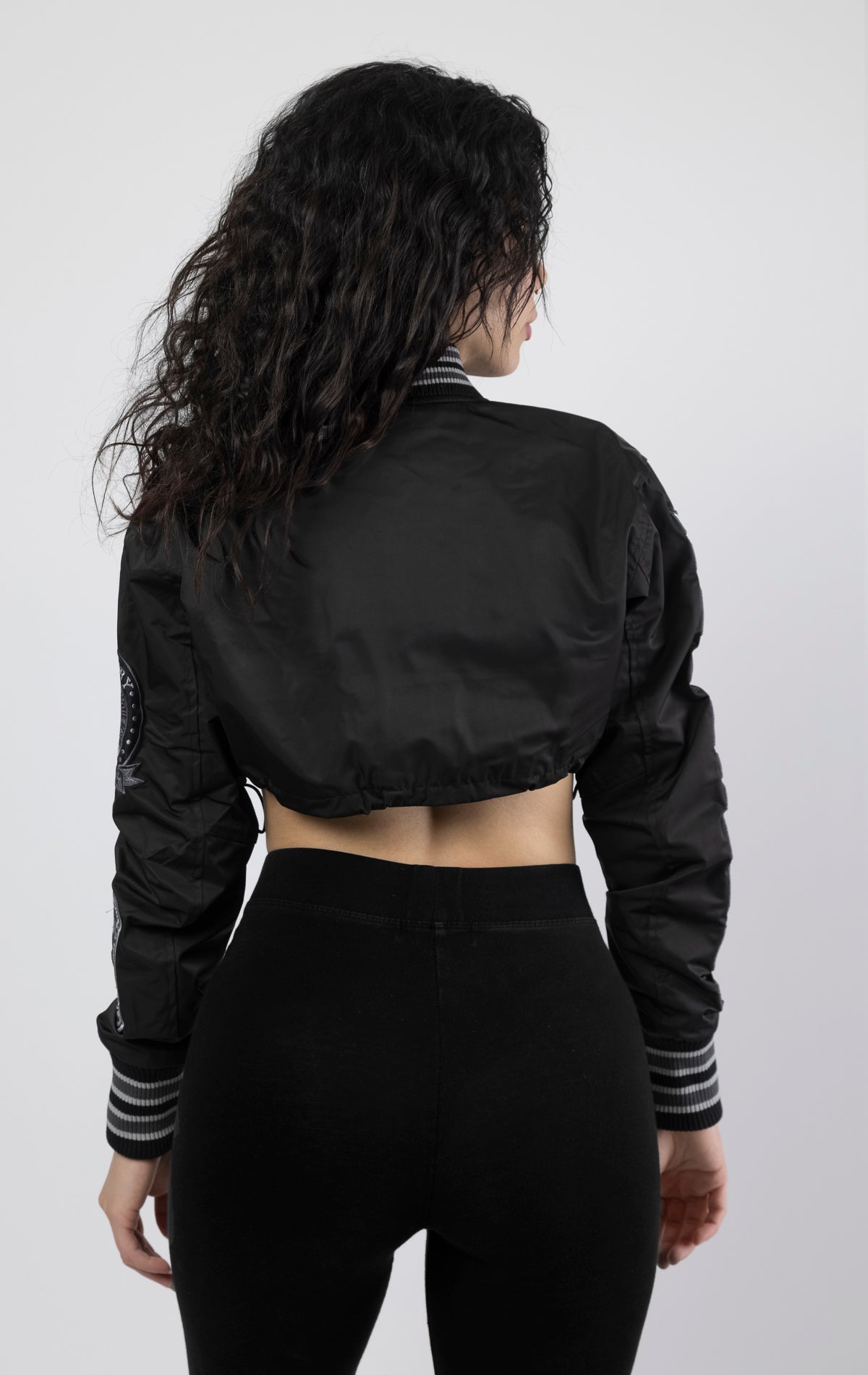 Black Cropped nylon patch jacket.